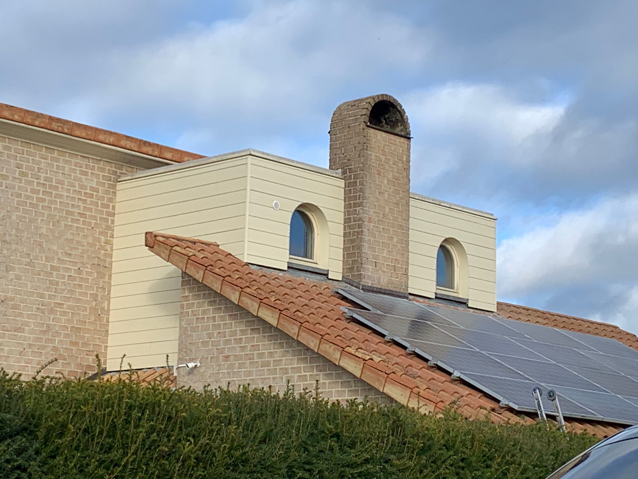 Gevelbekleding te Veldwezelt in Veldwezelt