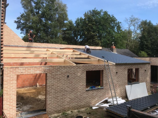 Hellend Dak en Plat Dak van een Nieuwbouw te Genk in Genk, foto 10