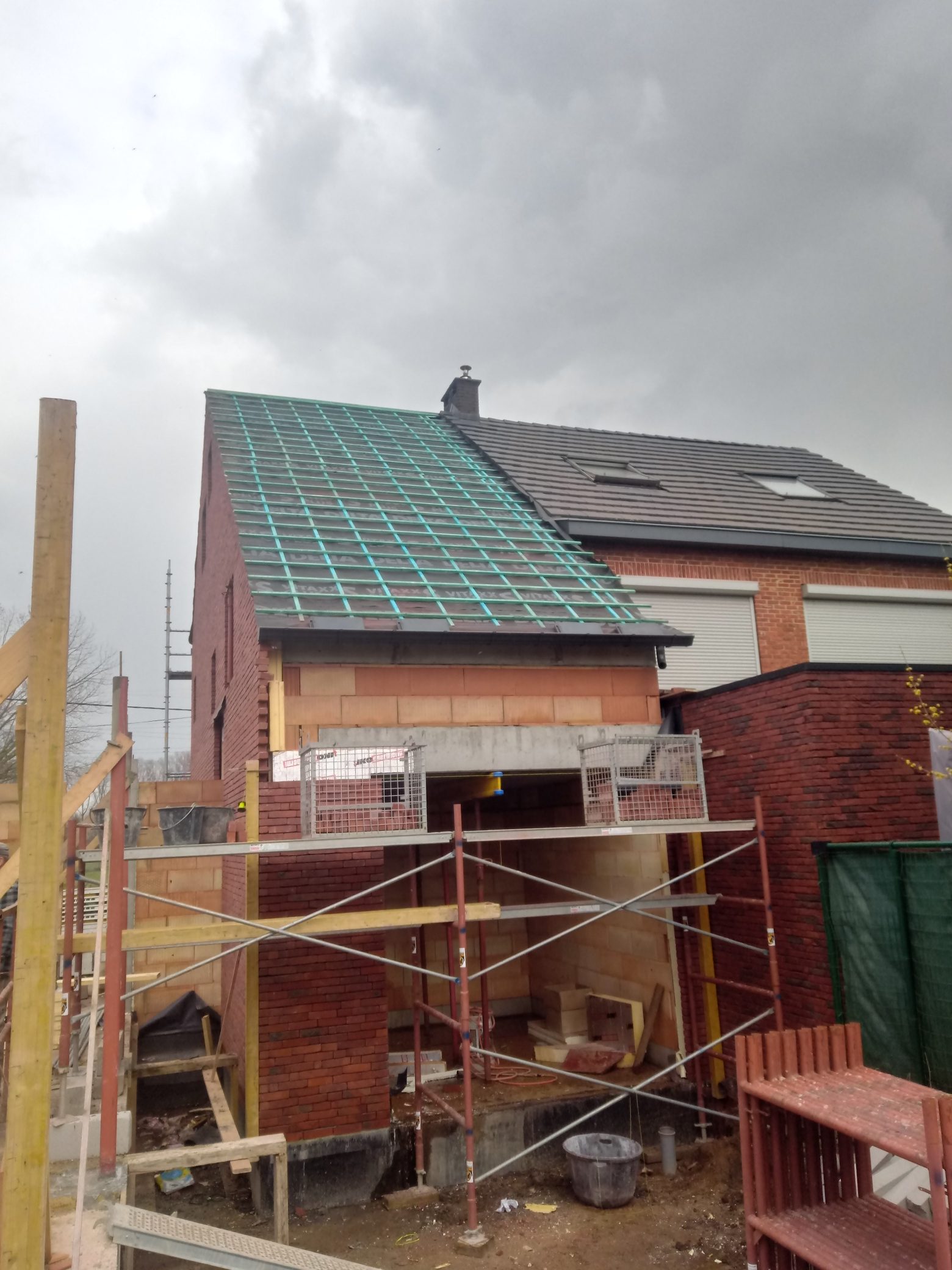 Hellend Dak en Plat Dak van een Nieuwbouw te Hasselt in Hasselt, foto 4