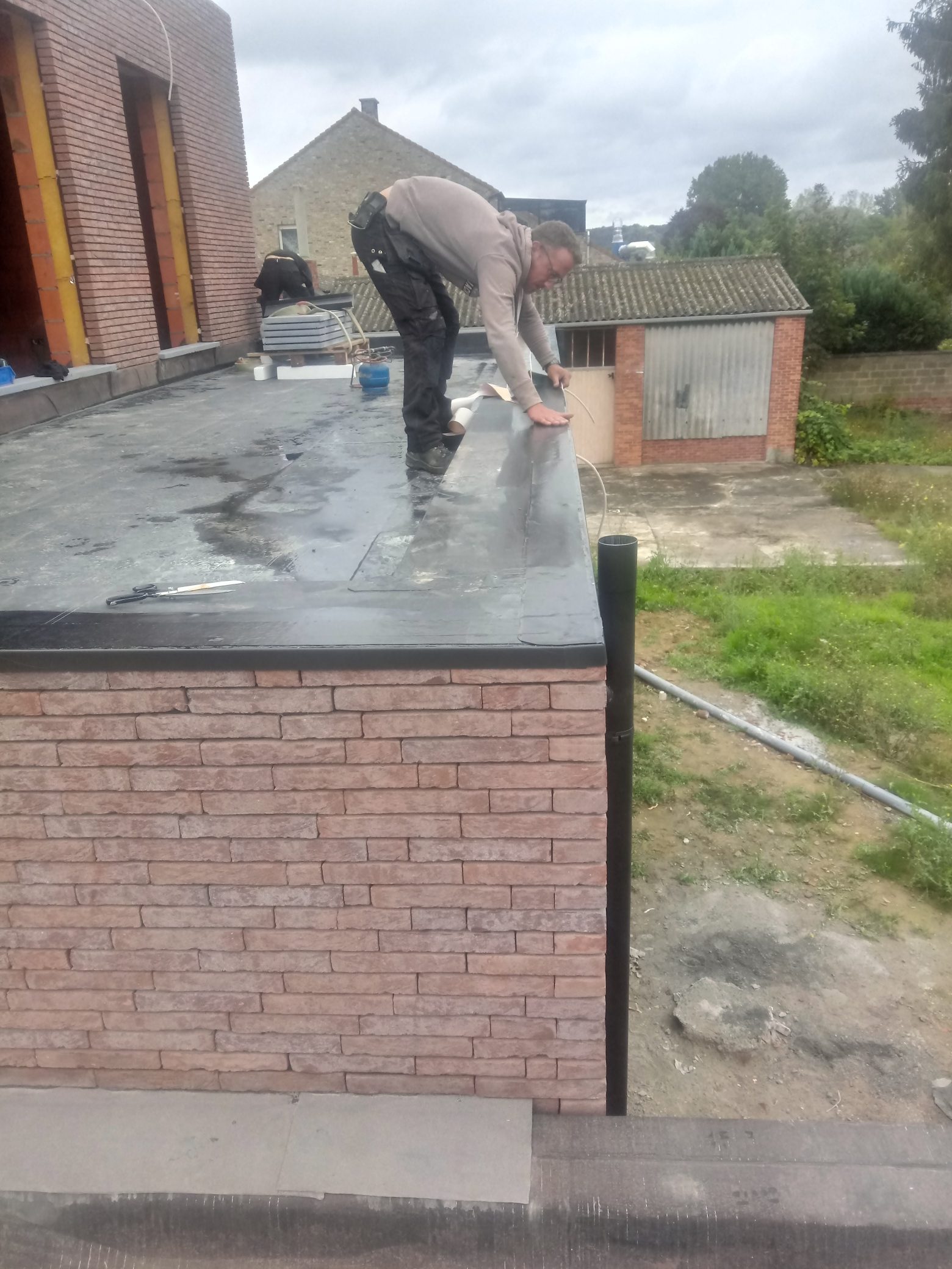 Hellend Dak en Plat Dak van een Nieuwbouw te Rotselaar in Rotselaar, foto 11
