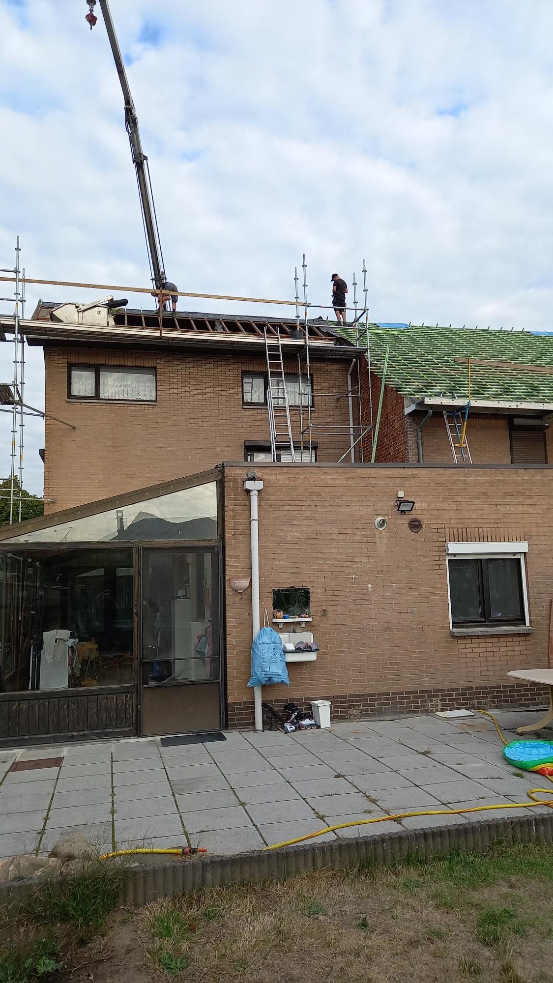 Renovatie van een Hellend Dak van een Dubbele Woonst te Maasmechelen in Maasmechelen, foto 4