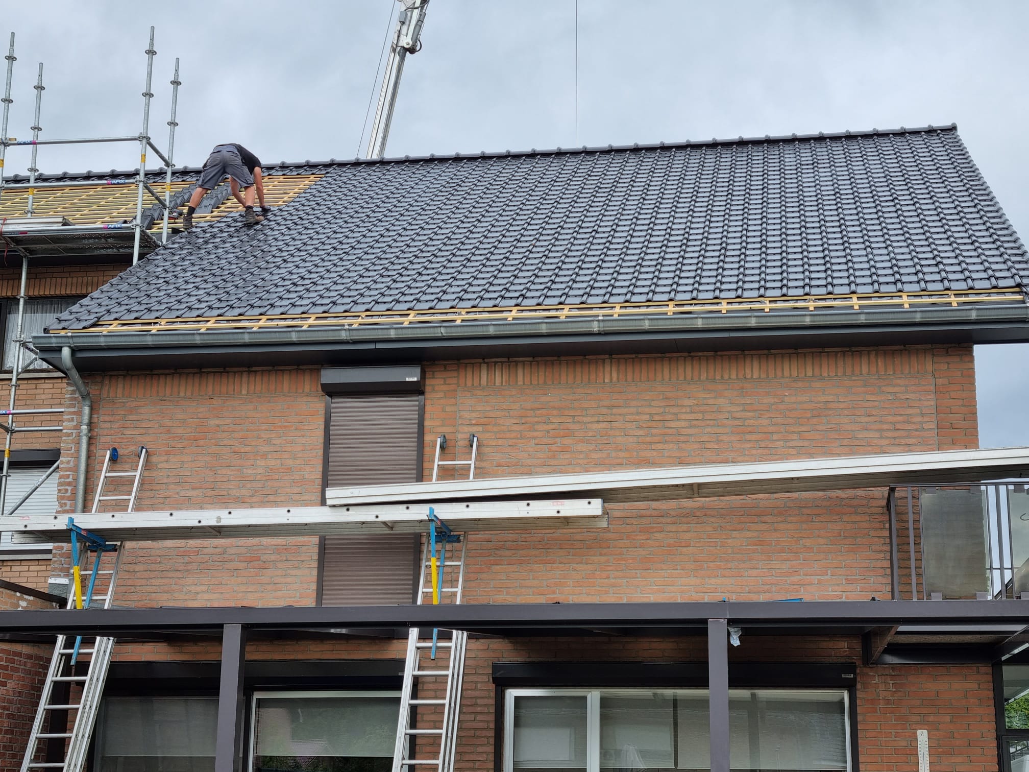 Renovatie van een Hellend Dak van een Dubbele Woonst te Maasmechelen in Maasmechelen, foto 8
