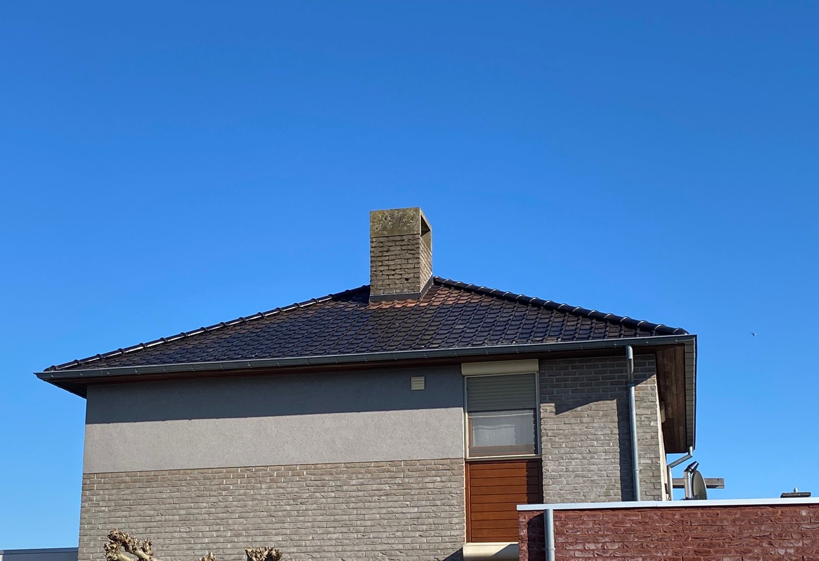 Renovatie van een Hellend Dak te Dilsen in Dilsen