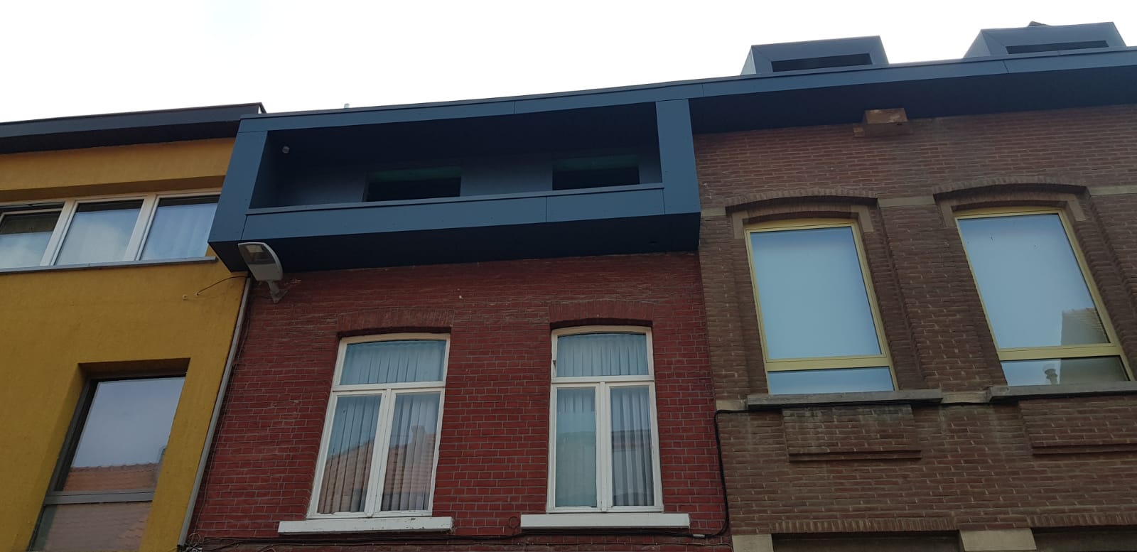 Renovatie Hellend Dak uit PVC Alkor – Gevelbekleding uit Lariks Hout te Leuven in Leuven, foto 7