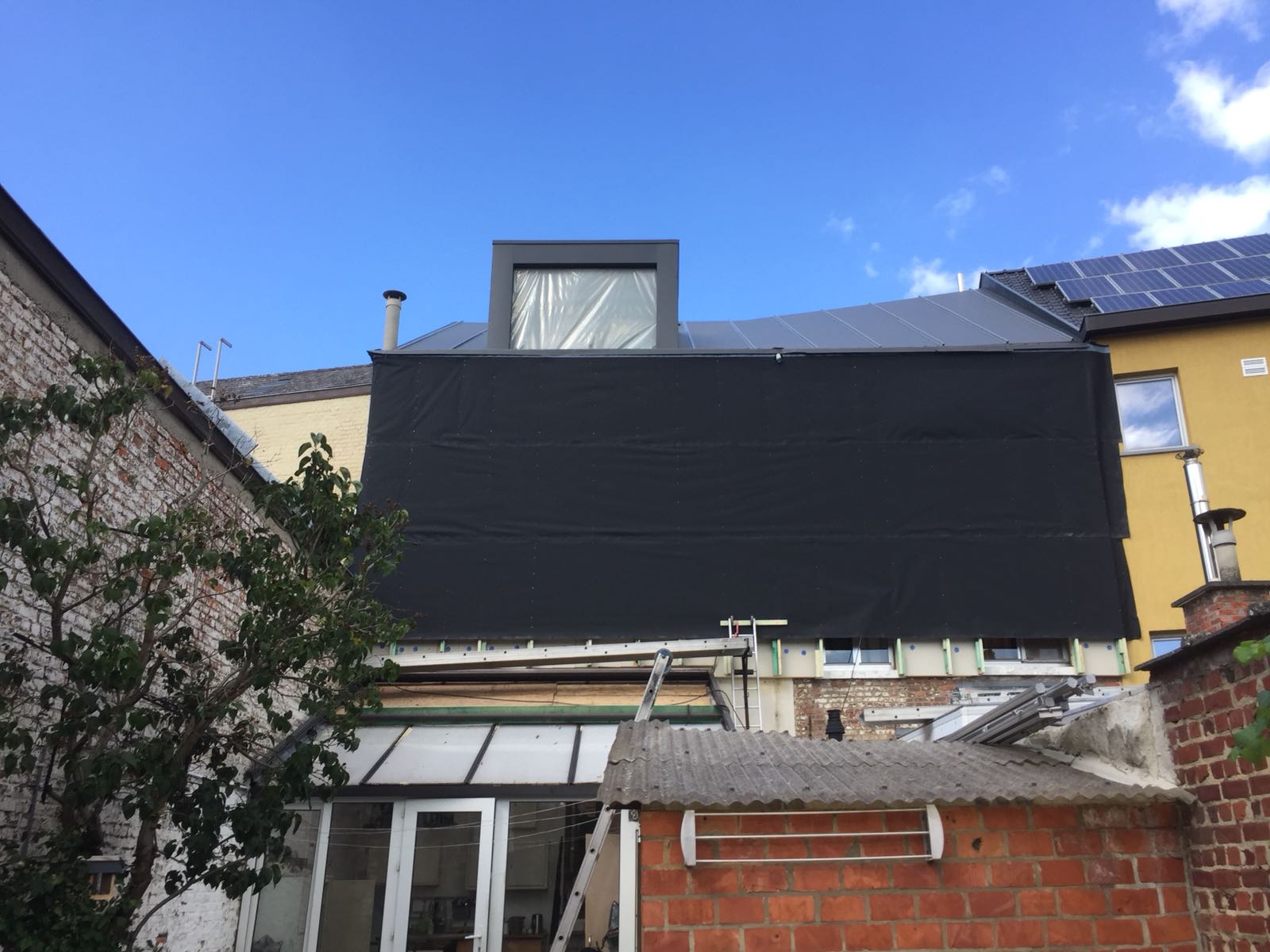 Renovatie Hellend Dak uit PVC Alkor – Gevelbekleding uit Lariks Hout te Leuven in Leuven, foto 9