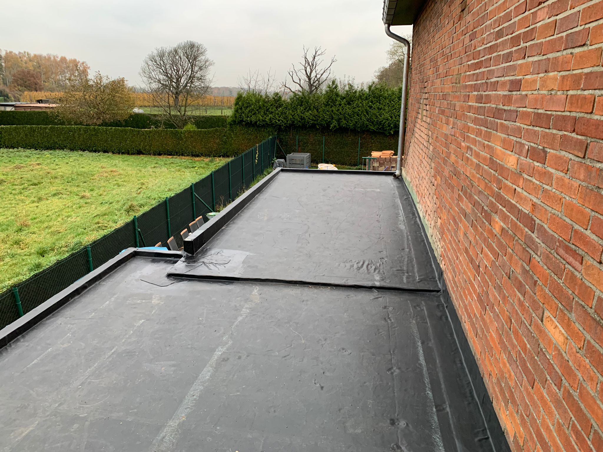 Renovatie van een Hellend en Plat Dak te Hoeselt in Hoeselt, foto 5