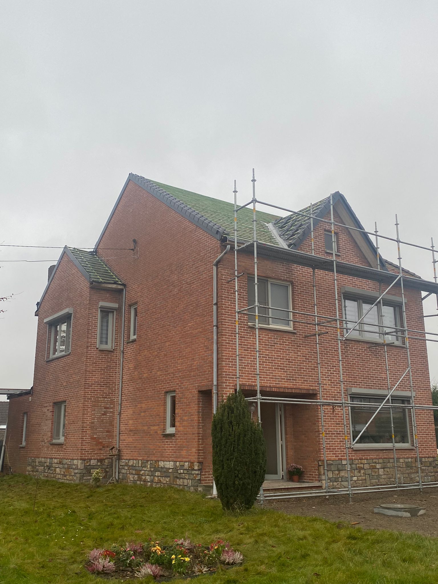 Renovatie van een Hellend en Plat Dak te Hoeselt in Hoeselt, foto 12