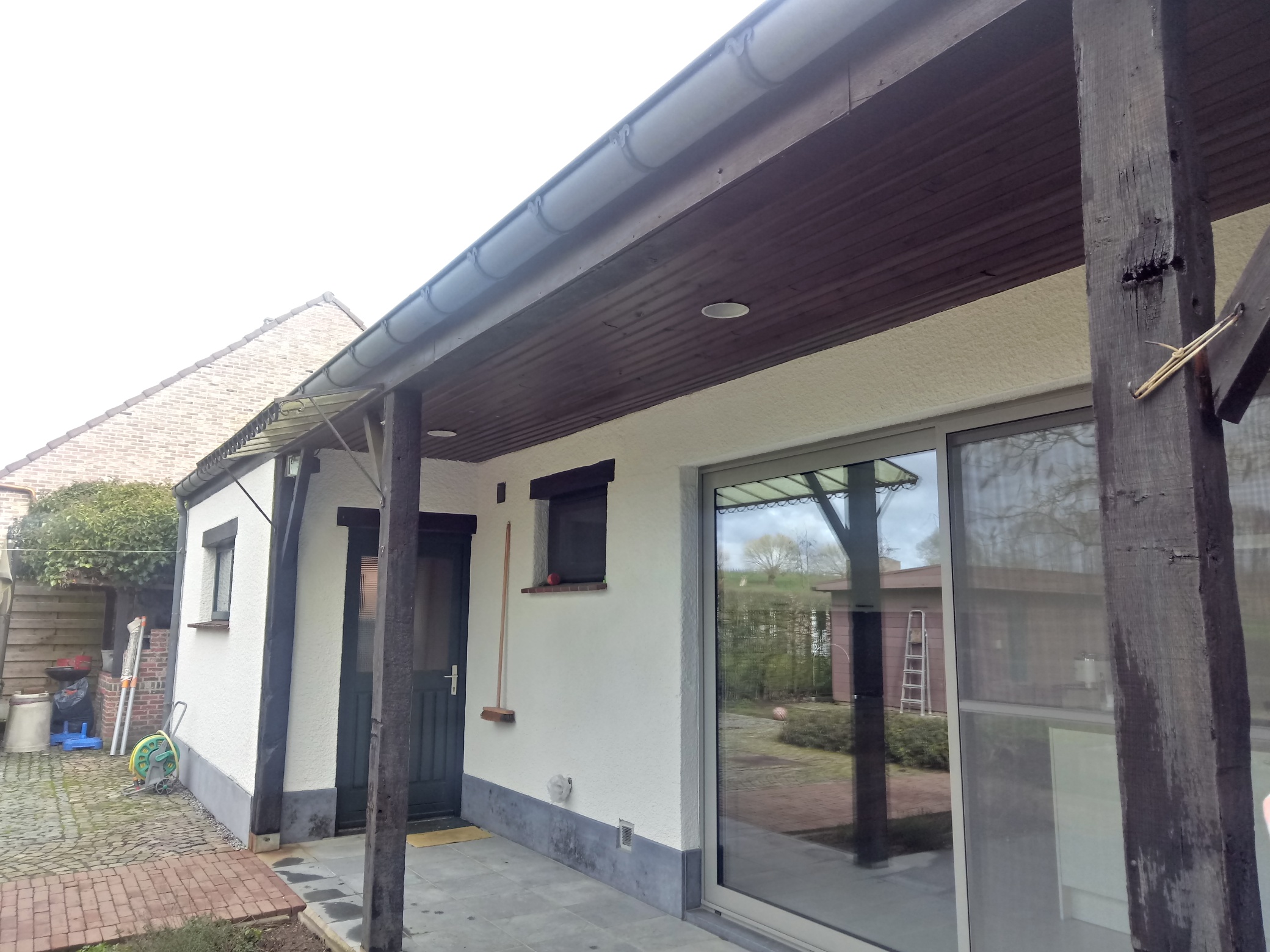 Renovatie van een Overdekt Terras uit Padoek Hout te Halen in Halen, foto 3