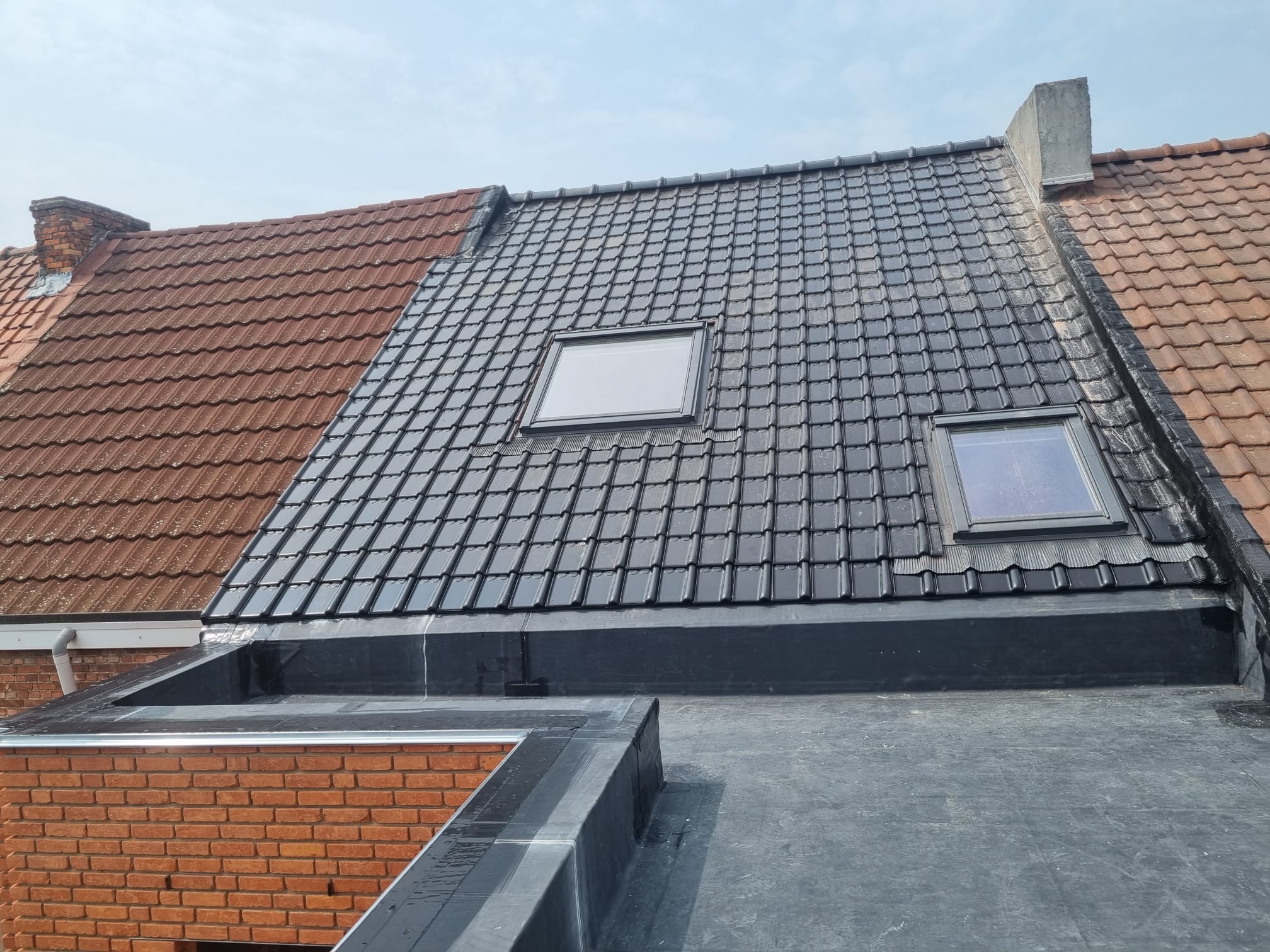 Renovatie van Hellend en Plat Dak te Hasselt in Hasselt