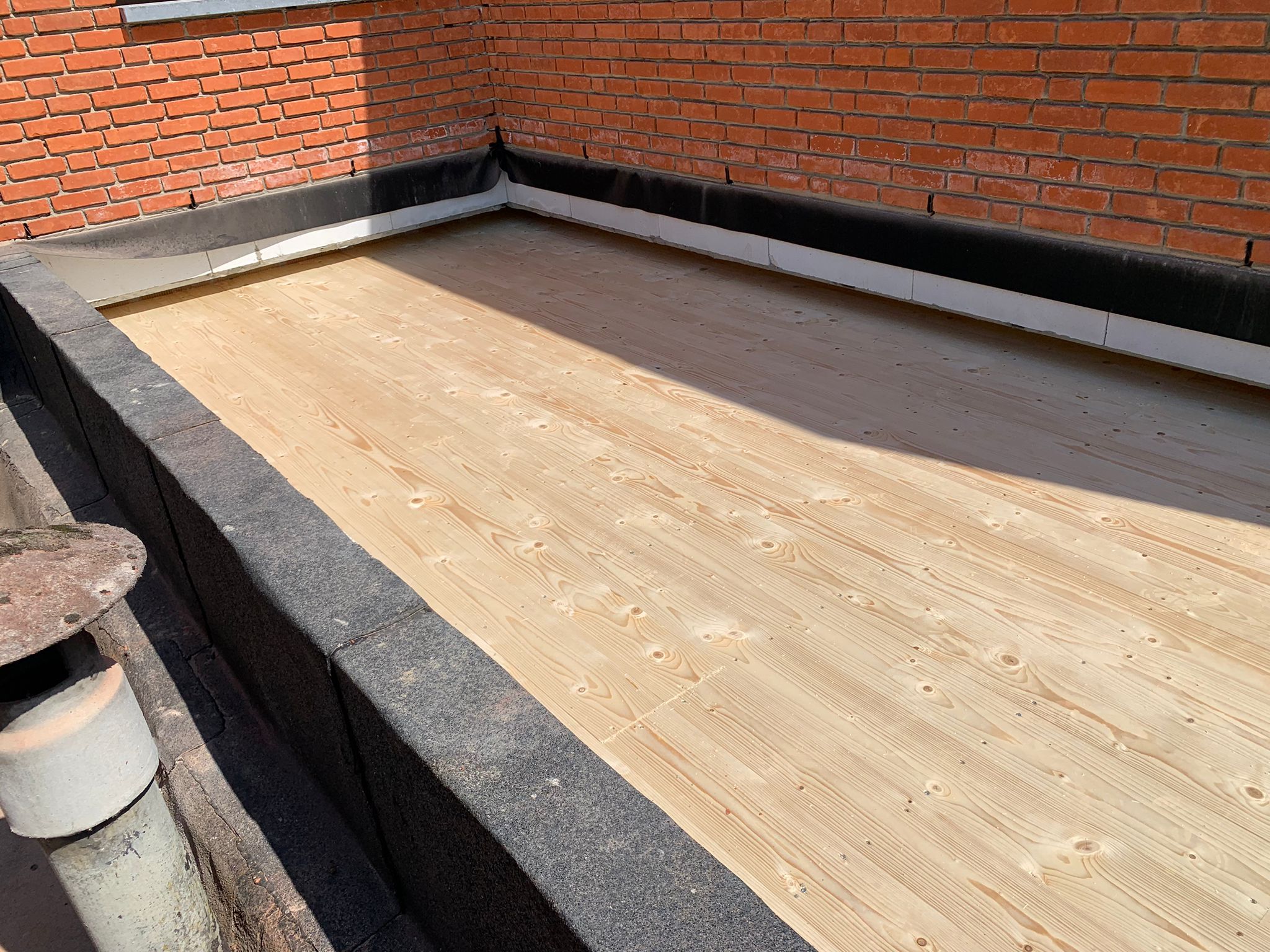 Renovatie van Hellend en Plat Dak te Hasselt in Hasselt, foto 6