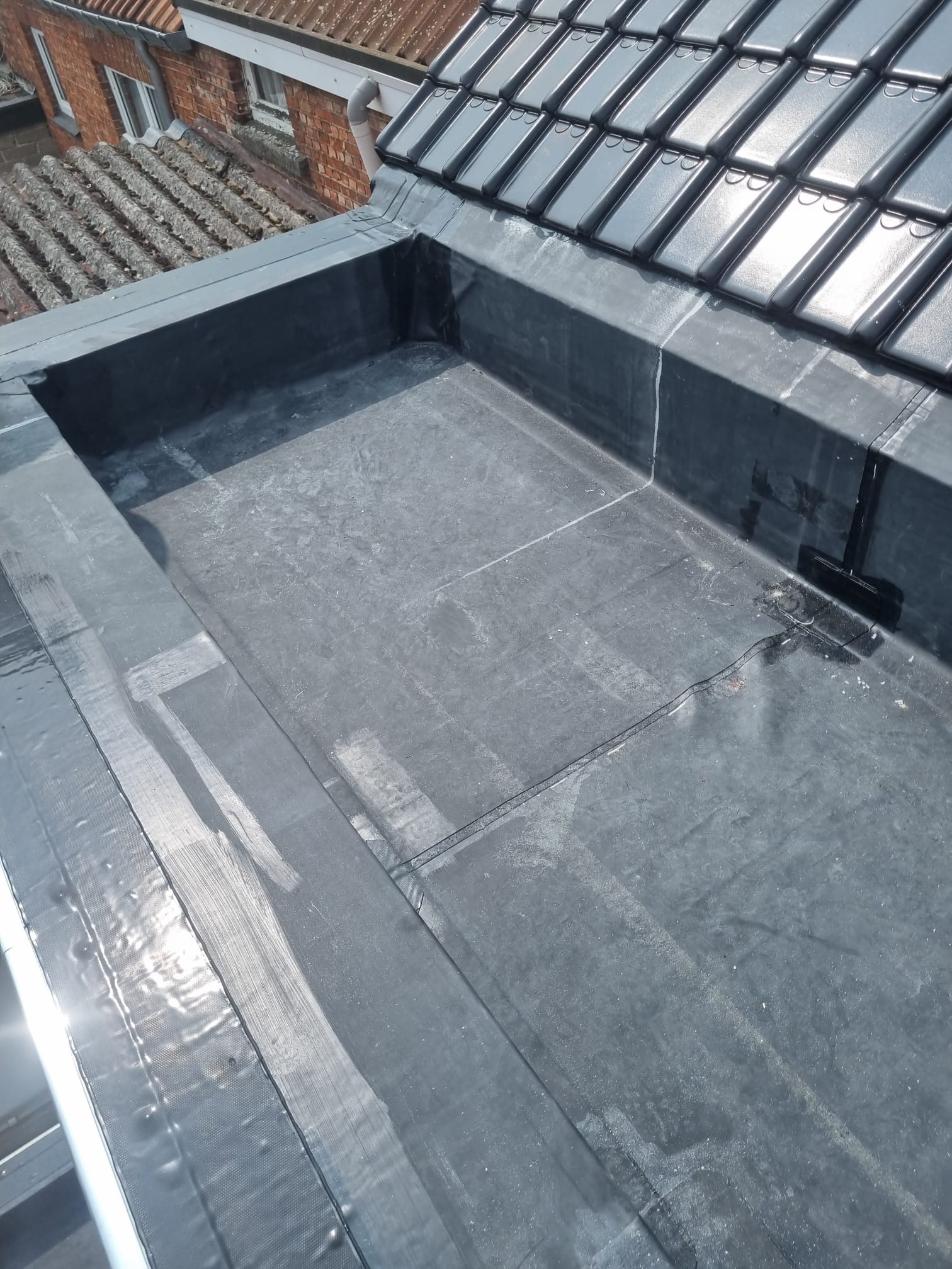 Renovatie van Hellend en Plat Dak te Hasselt in Hasselt, foto 11